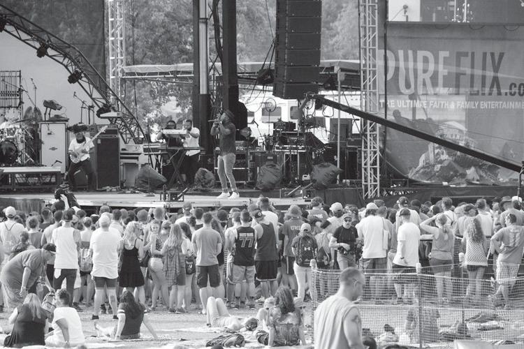 Christian hip-hop artist Sho Baraka performing before the Creation Festival main-stage crowd in 2017