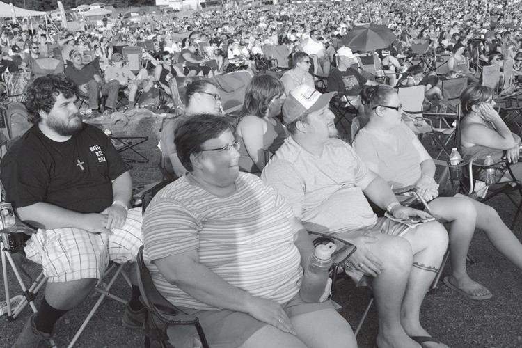 Members of Singers Gap United Methodist Church seated among the large Creation Festival audience in 2017
