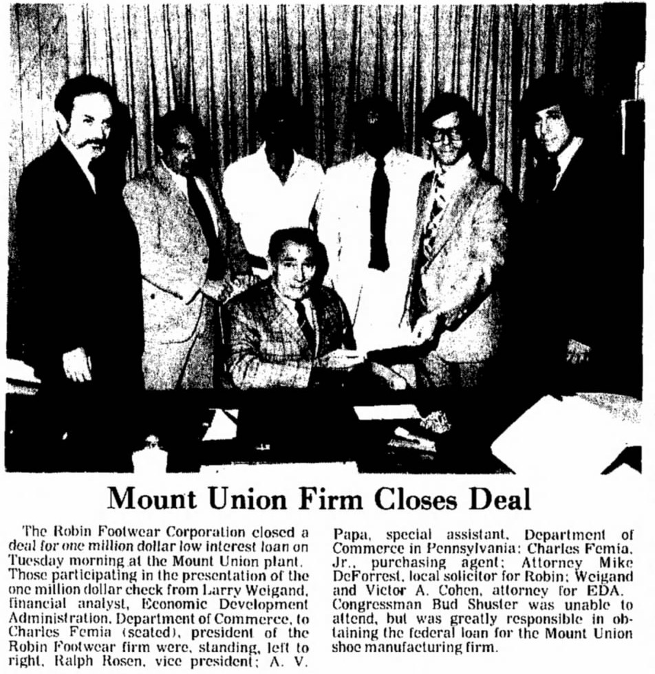 The federal-loan presentation, published August 31, 1977, p. 1. Charles Femia received the check from EDA financial analyst Larry Weigand.