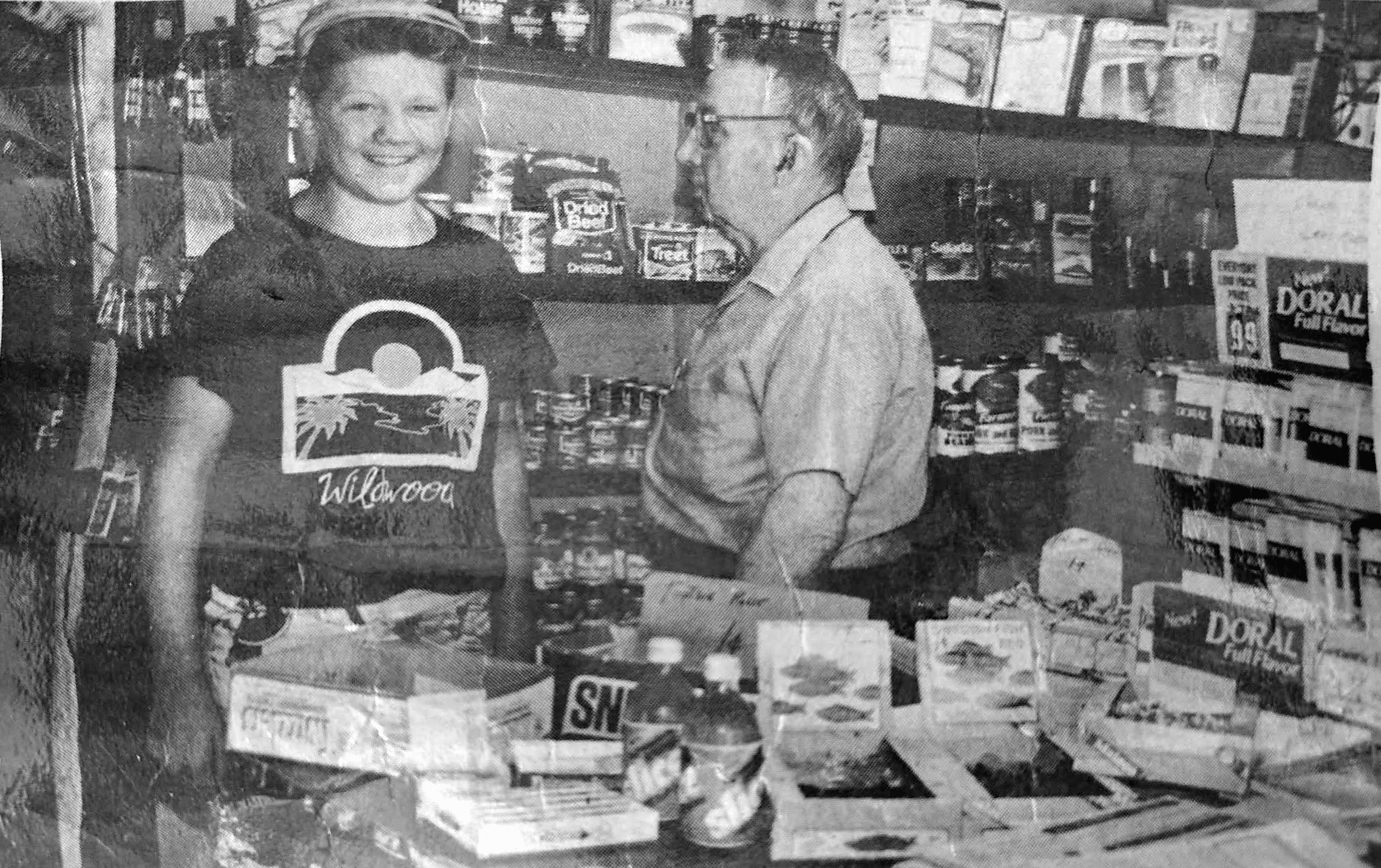 Johnny Hancock with his grandson Frank Crouse inside Hancock's Store
